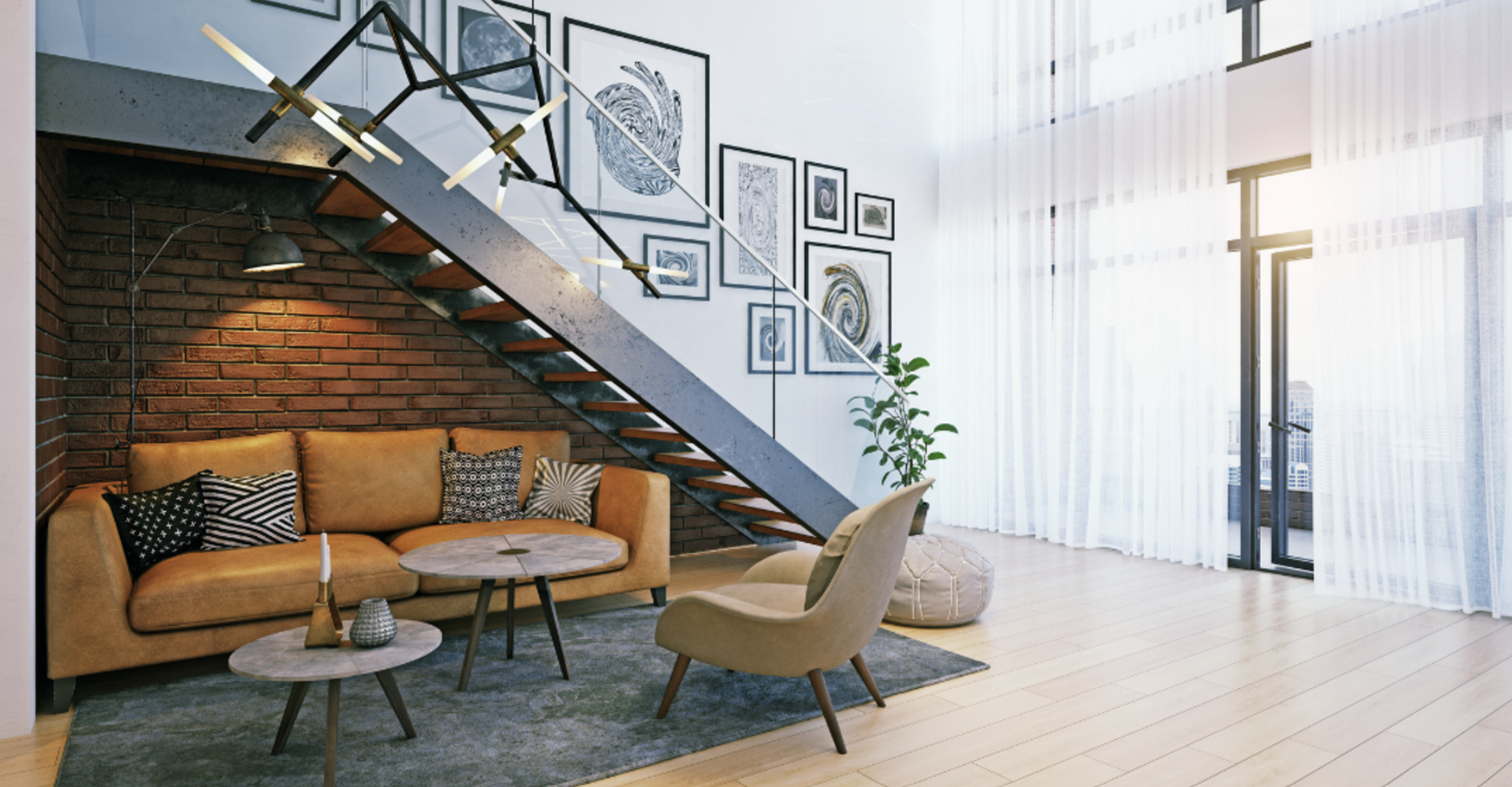 Seating area with a couch, chairs, staircase, and art