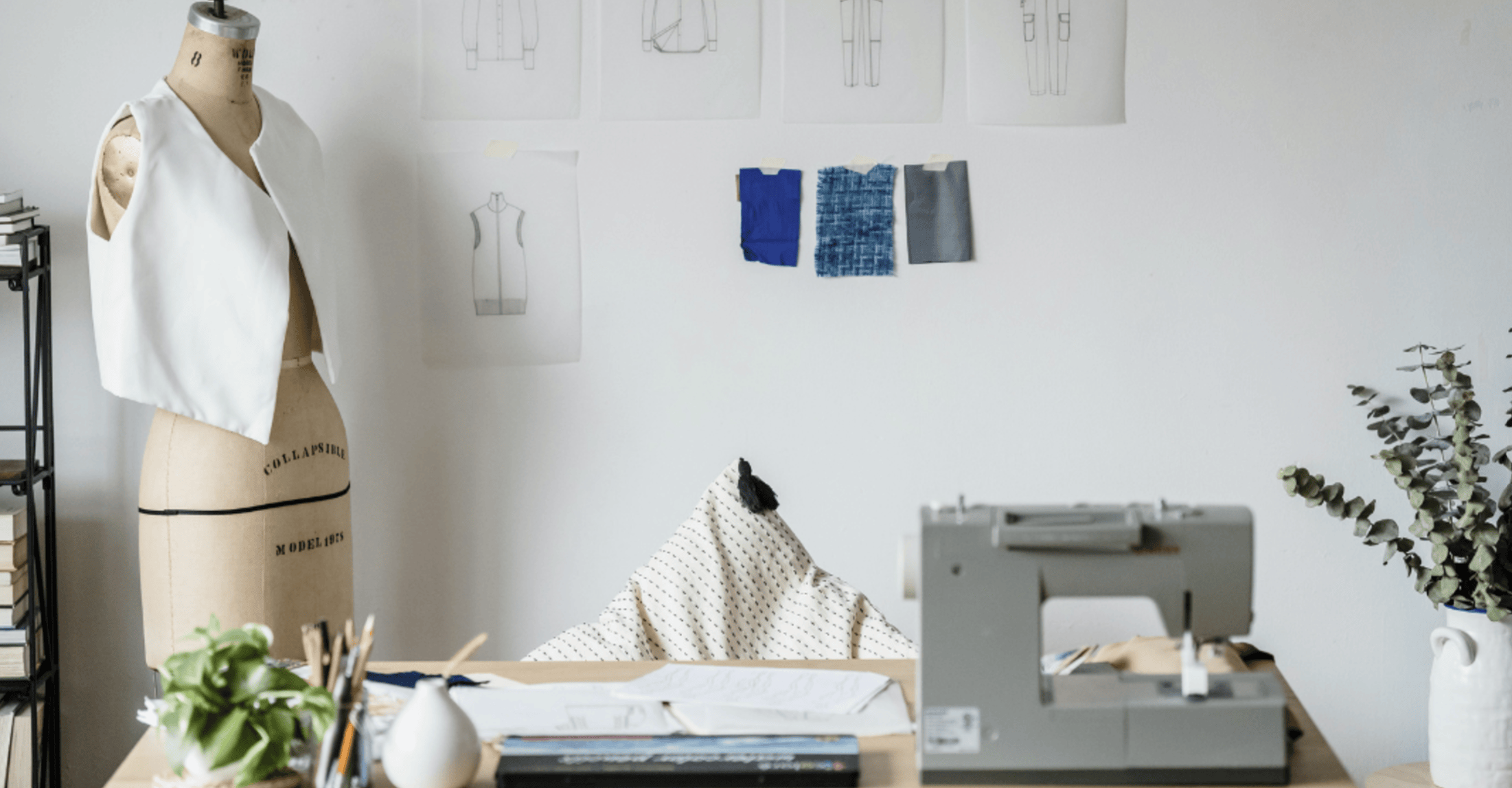 craft room with fabric samples, a dress form, and a sewing machine